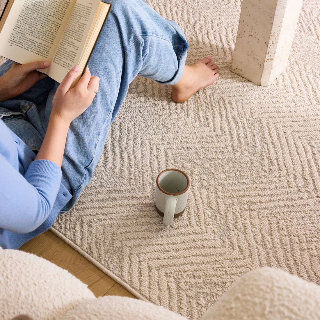 Neutral Elementa rug under a dining table, the best rug for dining room spills